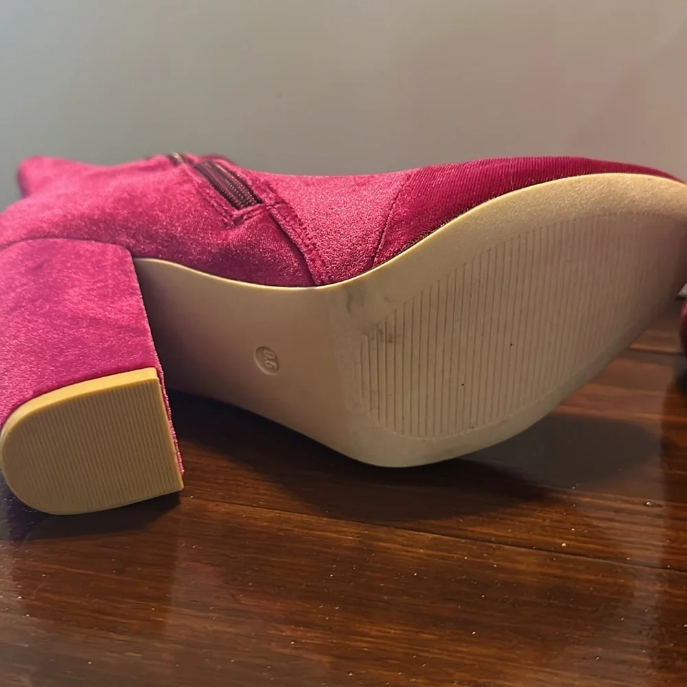 New but tried on Velvet Pink Ankle Boots. Size 9.5. Zip on side. Heel 4”.